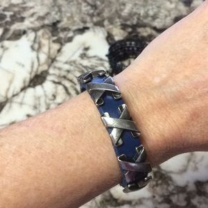 Blue leather bracelet with metal embellishments